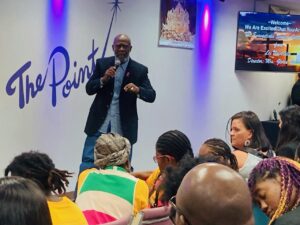 Pastor delivering message